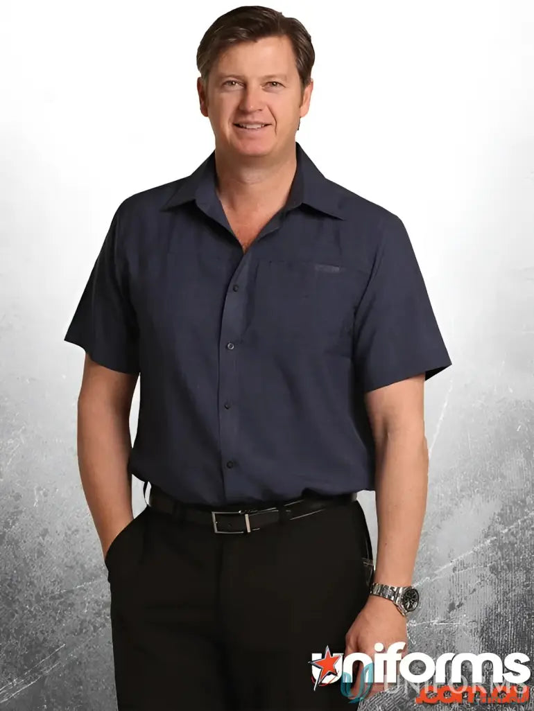 Man in navy cooldry short sleeve Winning Spirit M7600S Mens CoolDry shirt