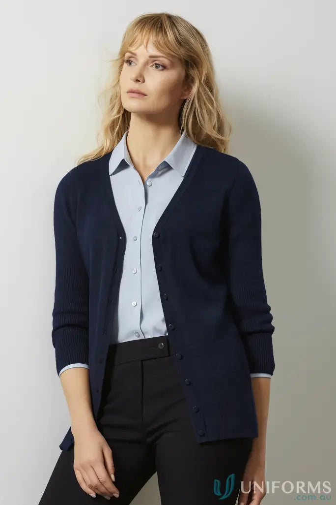 Woman in dark blue Milano Knit Cardigan perfect for work uniforms and easy care