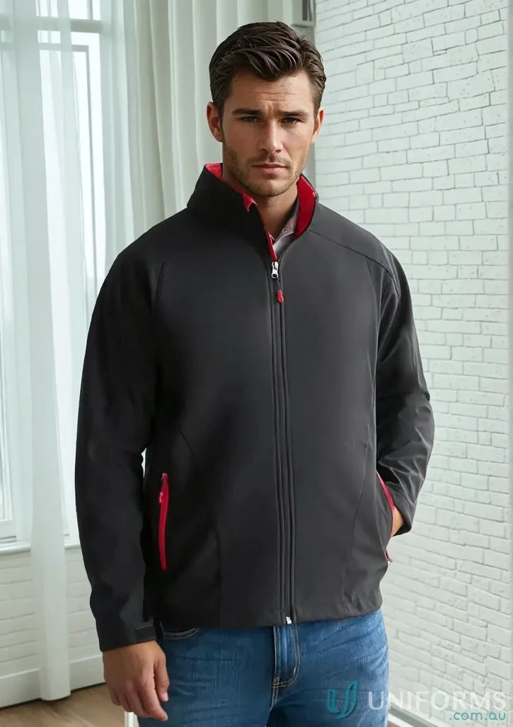 Geneva Gainsford Jacket in dark gray softshell with red accents and zippers for biz tech