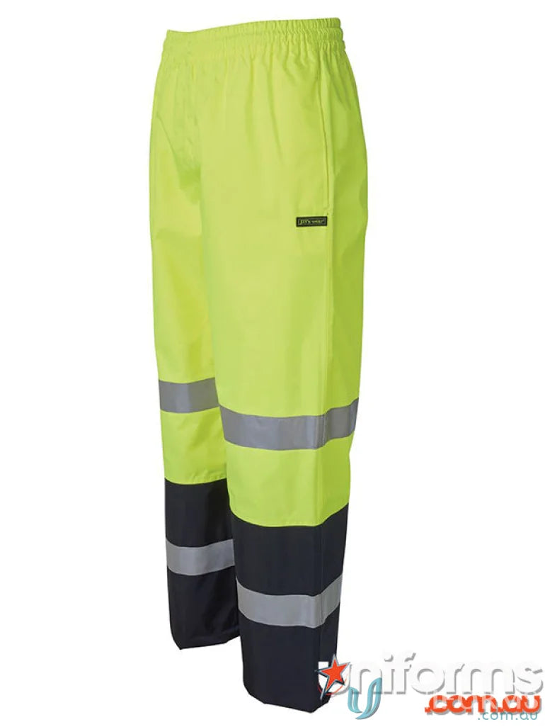 Yellow and black reflective safety pants from JBs Hi Vis Premium Rain Pant, extra large work uniforms