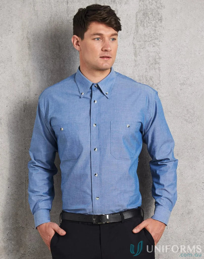 Man in a blue chambray long sleeve shirt showcasing mens chambray long style