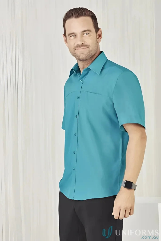 Man in teal Mens Oasis Short Sleeve Shirt, perfect for casual style