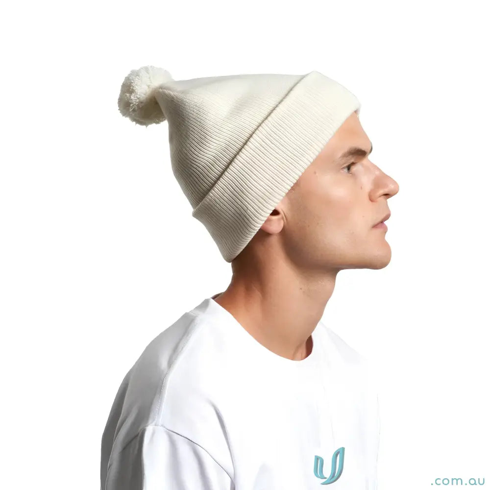 Light-beige recycled acrylic pom pom beanie with a cozy pom pom for winter warmth