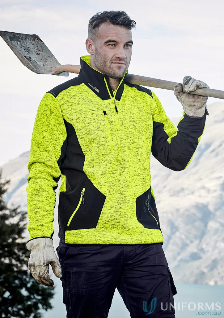 Man in workwear holding shovel showcasing Marle Knitted Fleece Zip Pullover ZT380