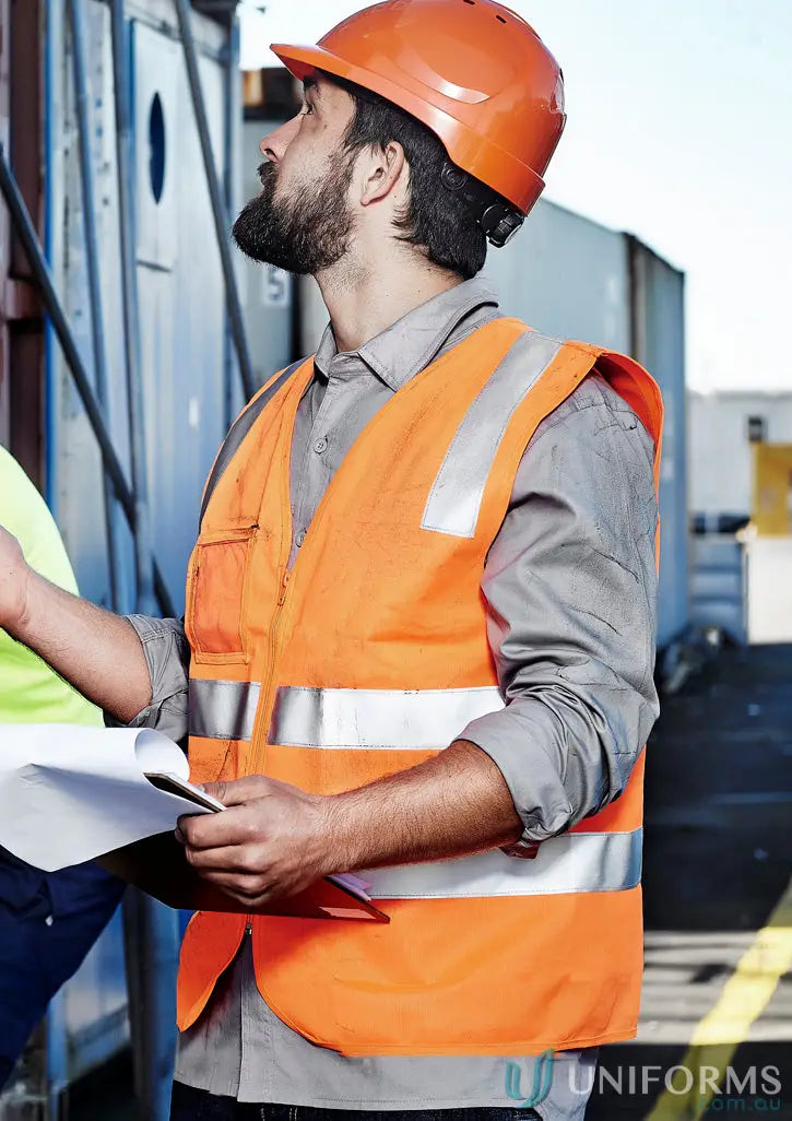 Construction worker wearing Syzmic Unisex Hi-Vis Full Zip Vest with reflective tape for safety
