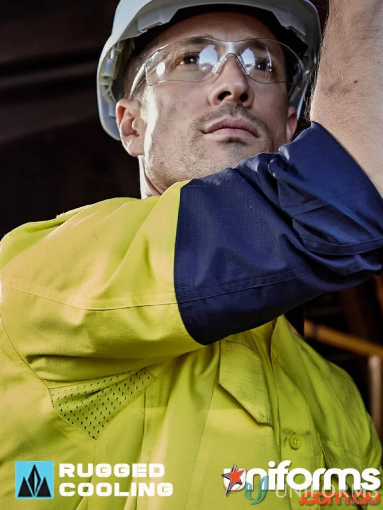 Construction worker in safety gear wearing Syzmik Mens Rugged Cooling Vis Shirt ZW128 highlighting stress points