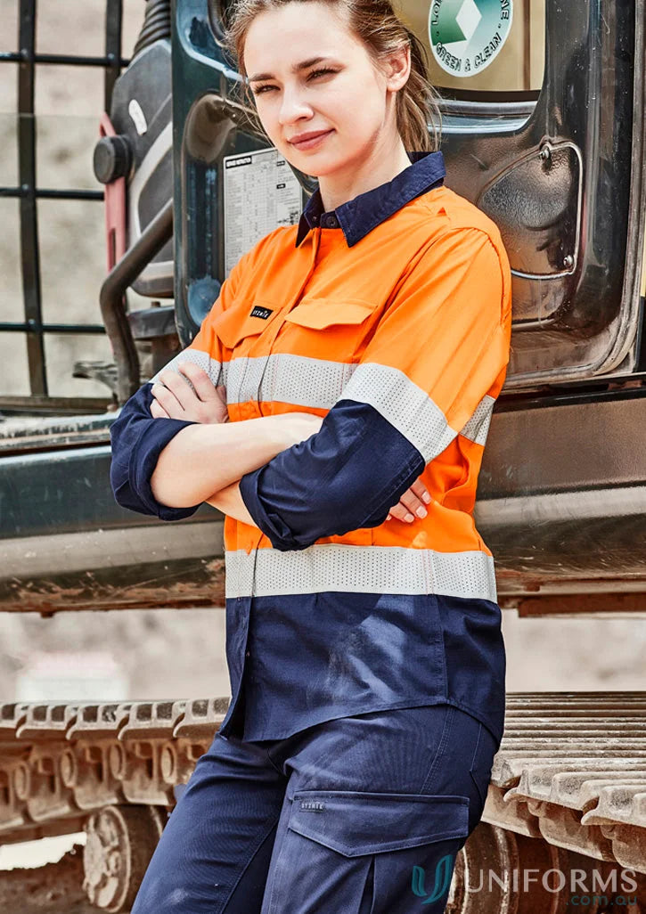 Woman in Syzmik womens rugged high-vis shirt zw720 with reflective tape for safety