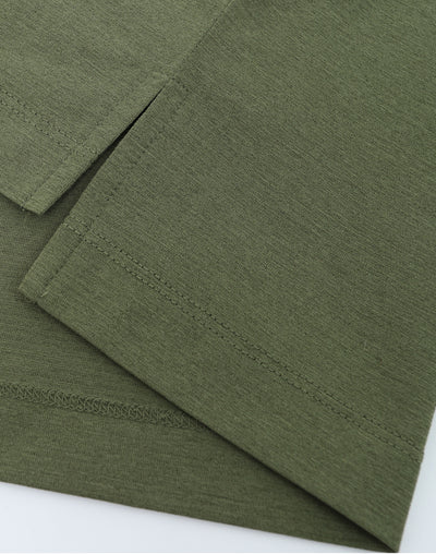 Close-up of green fabric with a white background