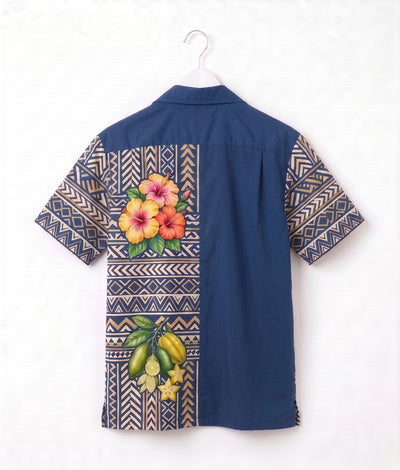 A navy blue short-sleeve button-up shirt hanging on a white hanger against a white wall. The back of the shirt features a split design: one side is solid navy blue, while the other side has a beige and navy geometric tribal pattern border.