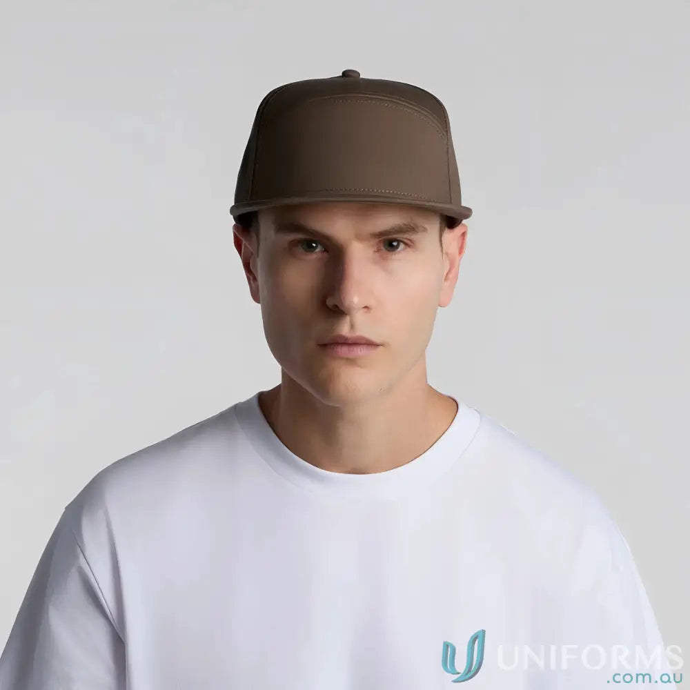 Man wearing olive green flat peak AS Colour 1184 cap with plastic snapback