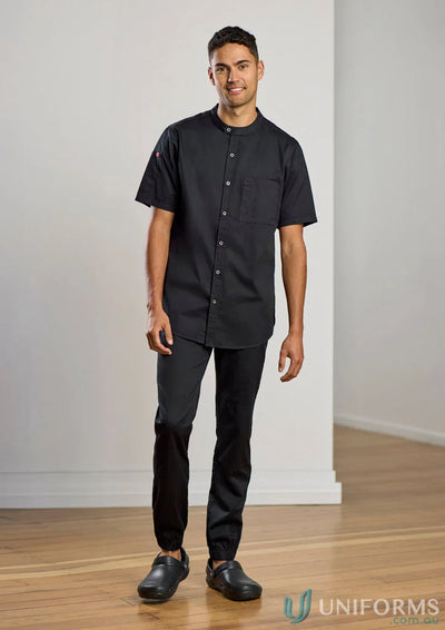 Man in black Cajun Chef Jogger Pant with reinforced knee patches and tapered fit