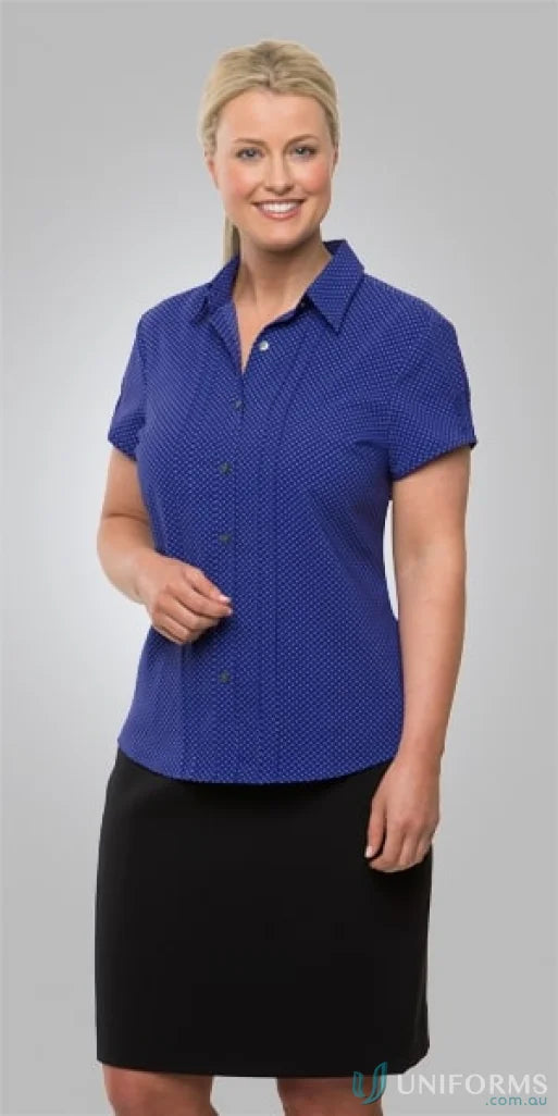 Smiling woman in City Stretch Spot Ladies SS Shirt with easy care, natural stretch, cap sleeve
