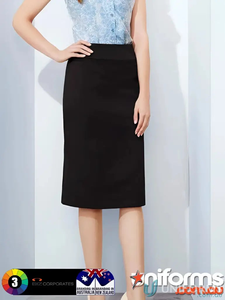 Woman modeling womens cool stretch relaxed fit lined black pencil skirt with blue pattern shirt