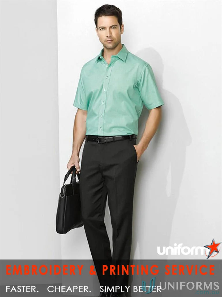 Man wearing cool stretch slimline pant in green shirt and black pants for mens cool stretch