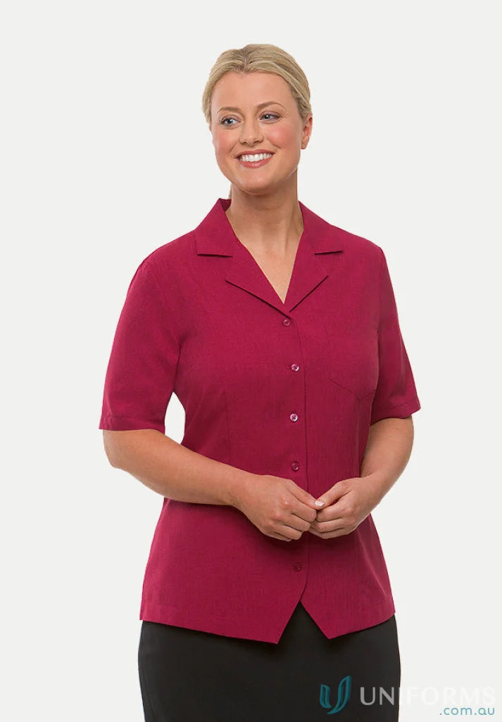 Woman in Ezylin Overblouse Ladies SS Shirt with breathable polyester and revere collar