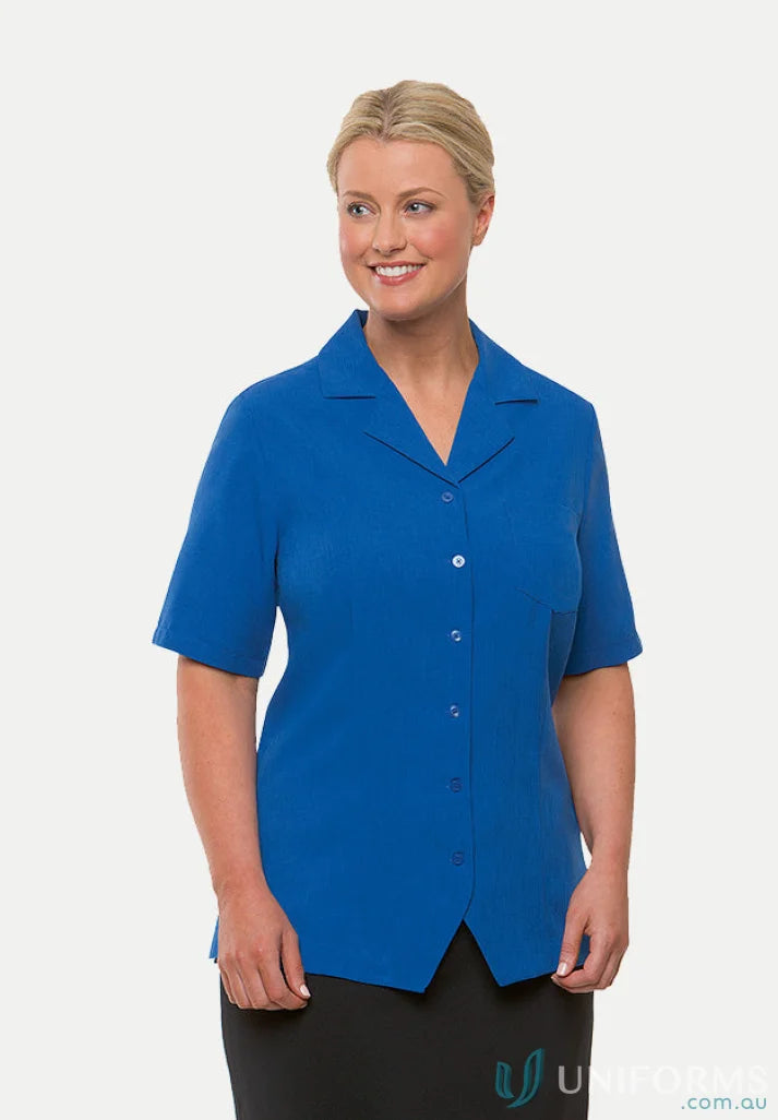 Woman in royal blue Ezylin Overblouse Ladies SS Shirt with revere collar, breathable polyester