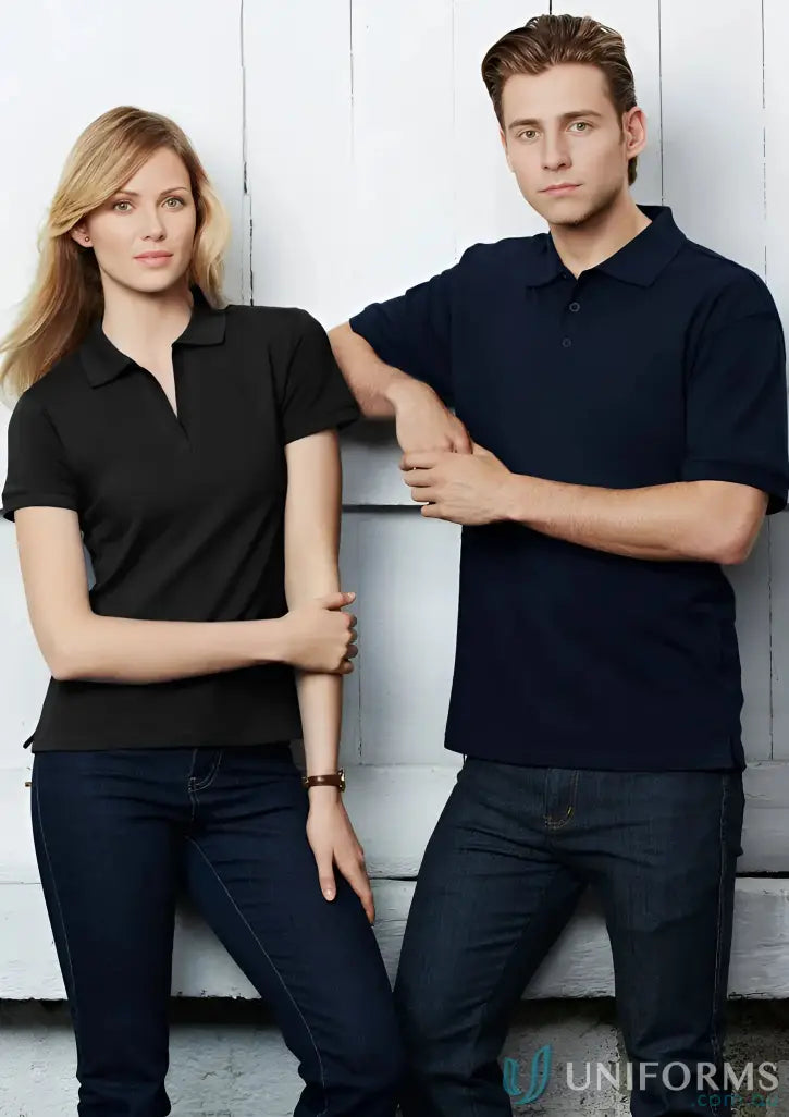 Two women showing off the oceana polo and jeans for effortless style