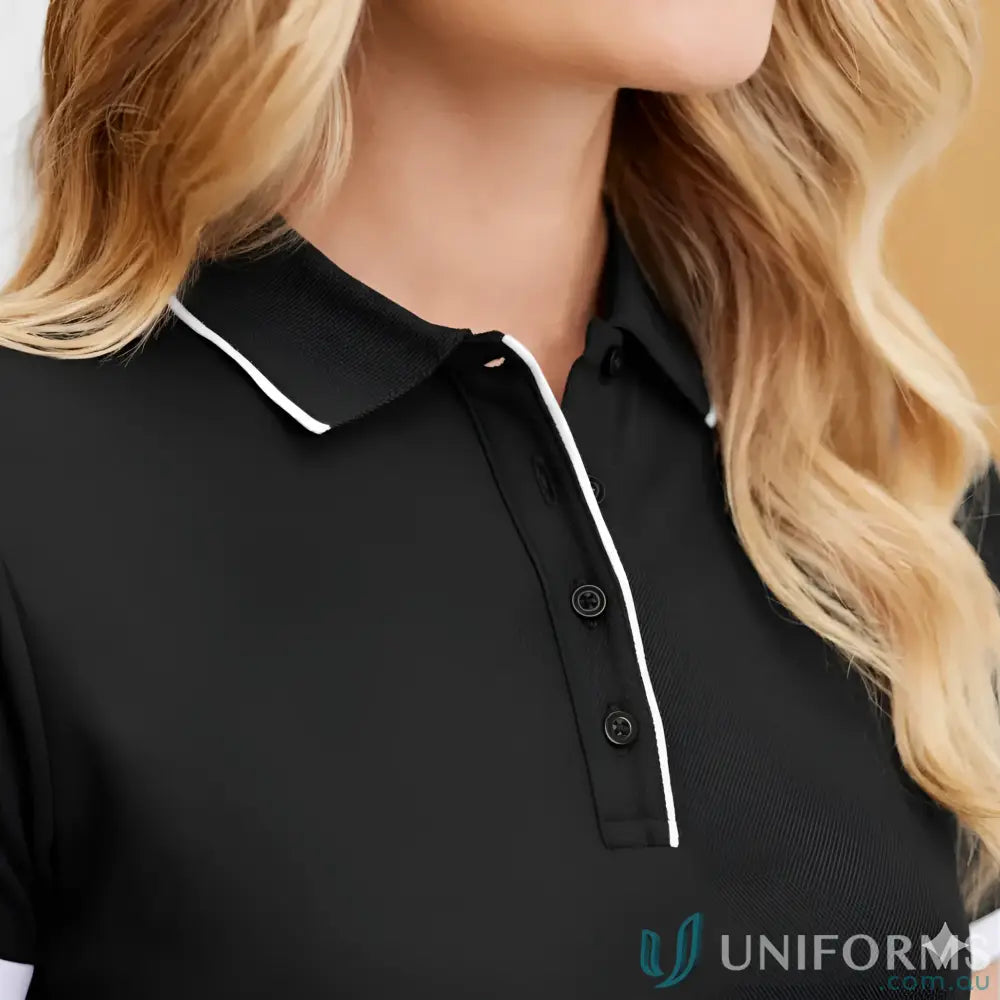Ladies focus polo in black cotton-backed pique with white trim and knit rib collar