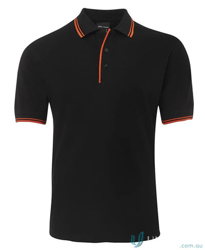 JBs Contrast Polo in black with orange trim, made from pique knit fabric for sun protection