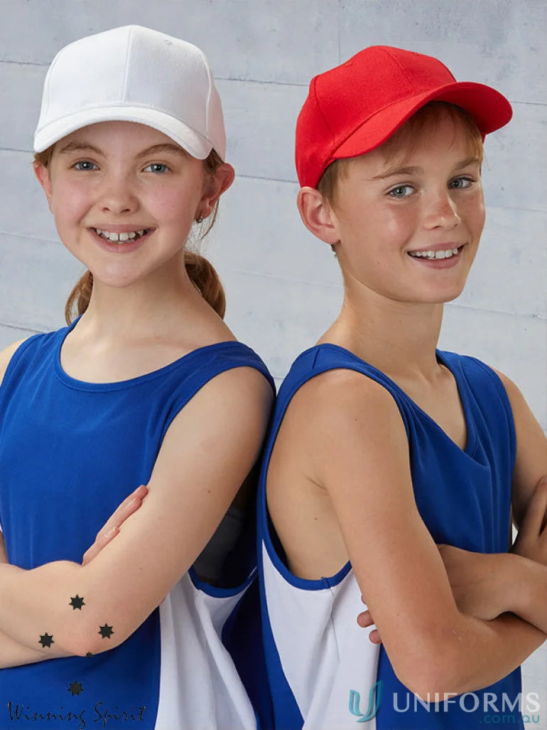 Kids wearing Winning Spirit heavy brushed cotton caps and athletic uniforms outdoors