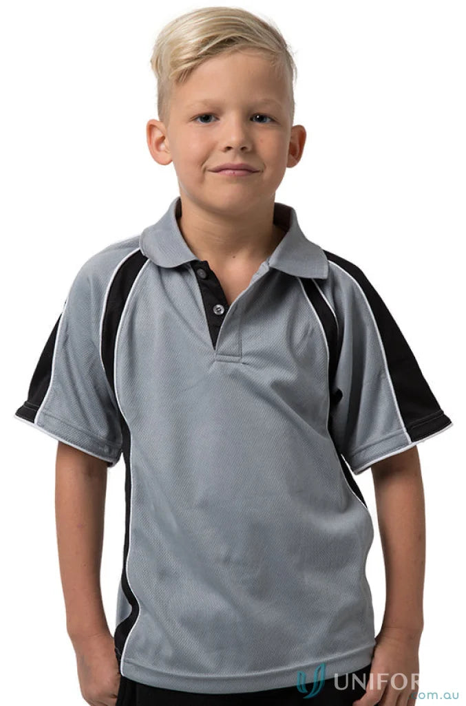 Boy wearing Kids Rozella Polo with cooldry moisture management technology for comfort