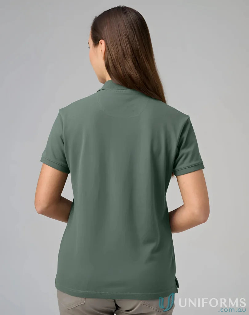 Womans green polo shirt from PS56 Darling Harbour with a winning spirit ladies vibe
