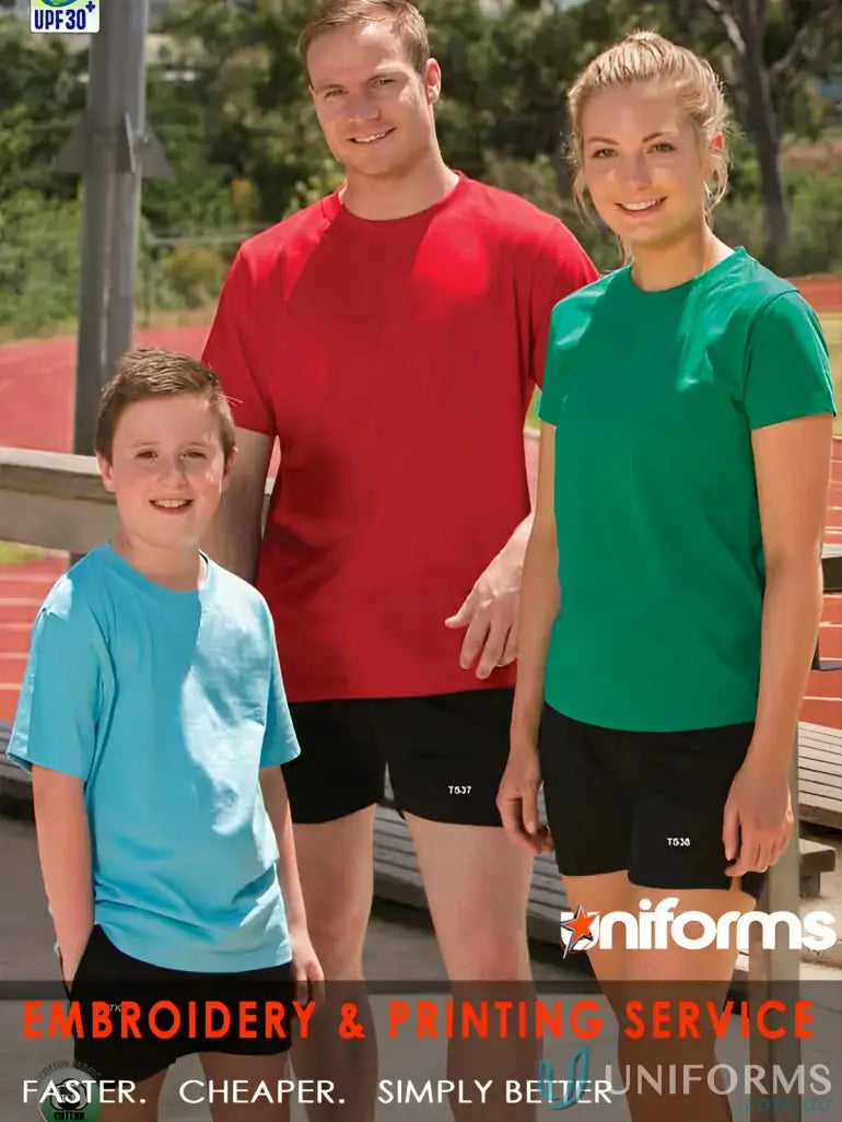 Three people in athletic wear showcasing the Ladies Savvy Tee ts38 savvy winning spirit ladies