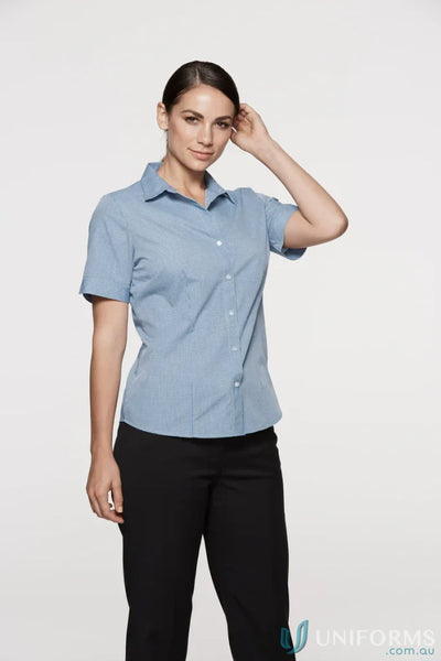 Woman in light blue Toorak S/S Shirt, perfect for workwear and uniforms