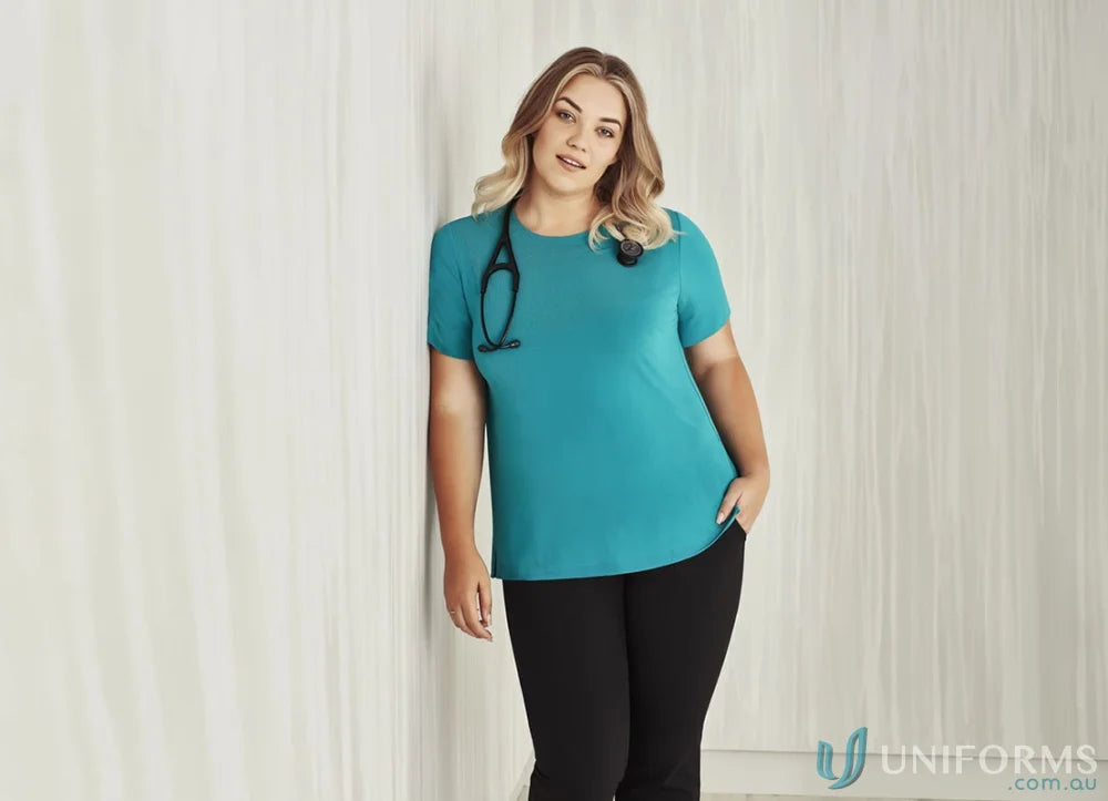 Woman in teal Bizcare Marley Soft Jersey T-Top CS952LS women’s short sleeve jersey top