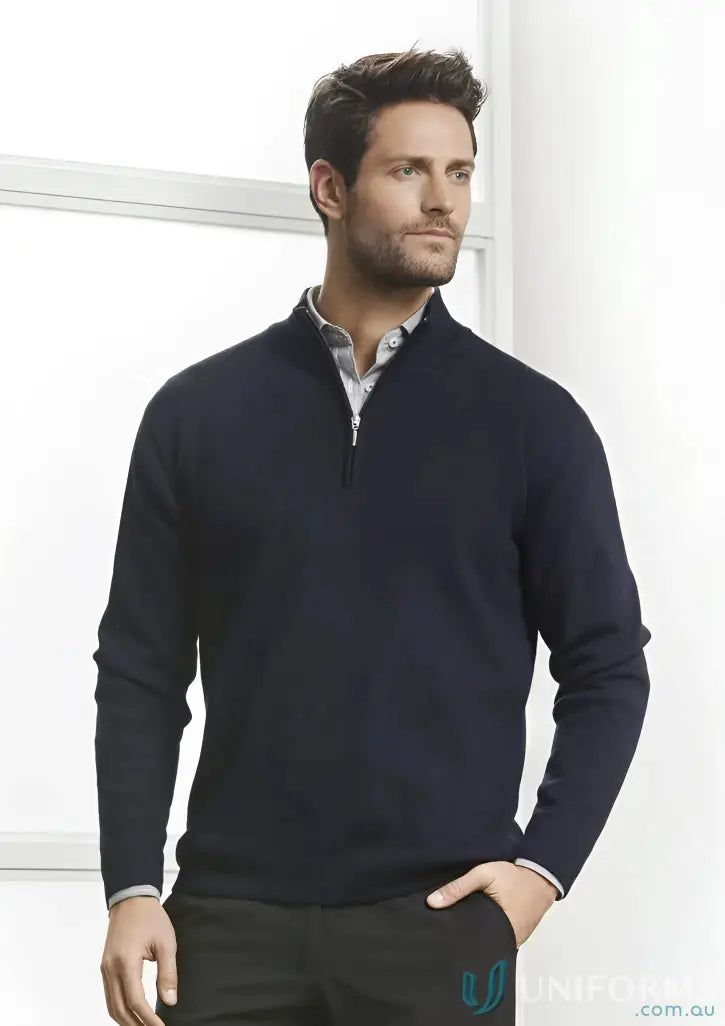 Men’s navy blue quarter-zip sweater over light shirt, perfect for work uniforms and workwear