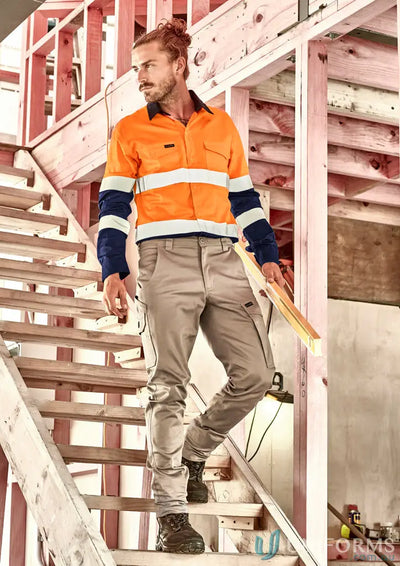 Male model wearing men’s essential basic stretch cargo pants with work shirt and boots