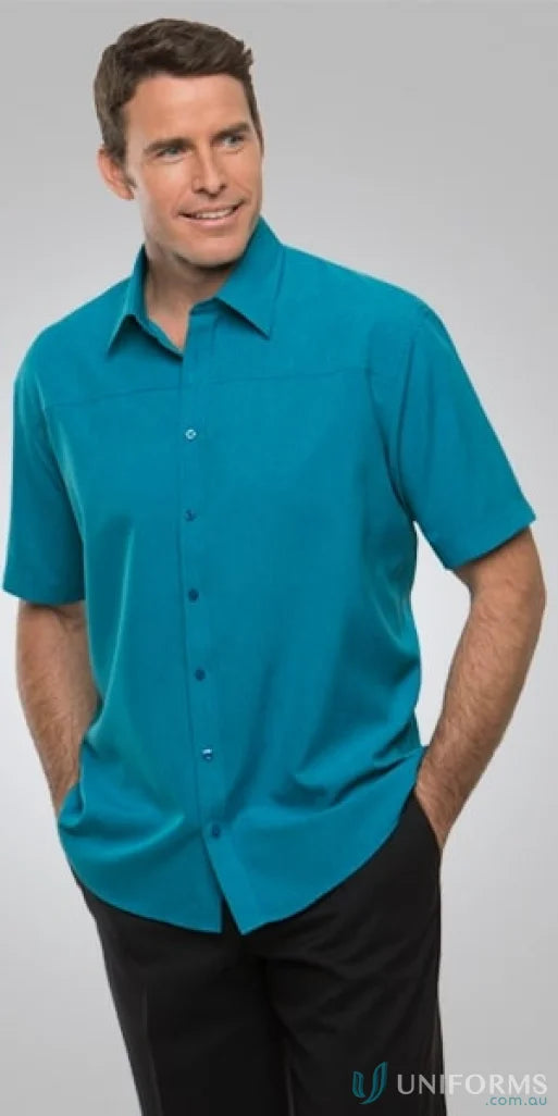 Smiling man wearing Mens Ezylin Short Sleeve Shirt in teal, perfect for sports uniforms