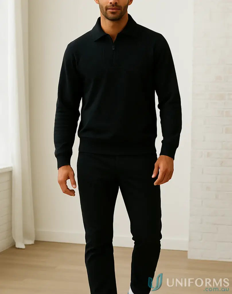Man wearing black Paramount Air Half Zip Sweater with zip fleecy style and matching pants