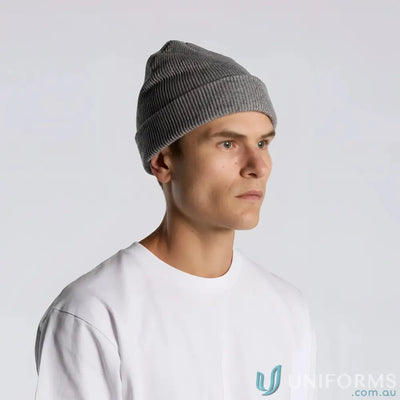 Person wearing a grey ribbed knit beanie and white t-shirt, stylish ribbed knit look