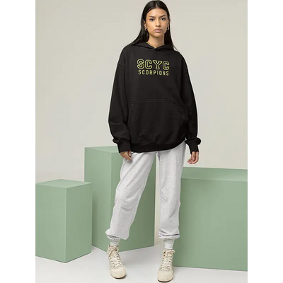 Black hoodie with light gray sweatpants.