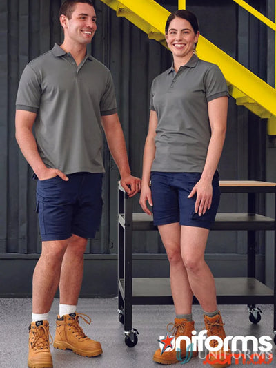 Two people wearing matching WP27 Unisex Cotton Stretch Rip Stop Work Shorts outdoors