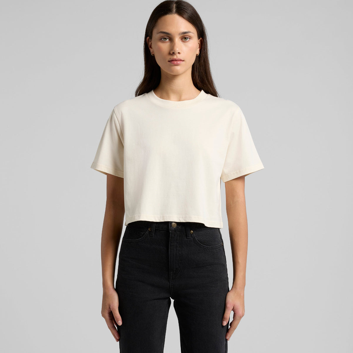 Cream-colored minimalist short-sleeved crop top with round neckline perfect for stylish workwear or casual uniforms